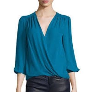 Alive and Olivia blue crossover shirt. Clasp missing.